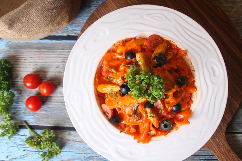 Penne alla vodka with creamy tomato sauce and basil